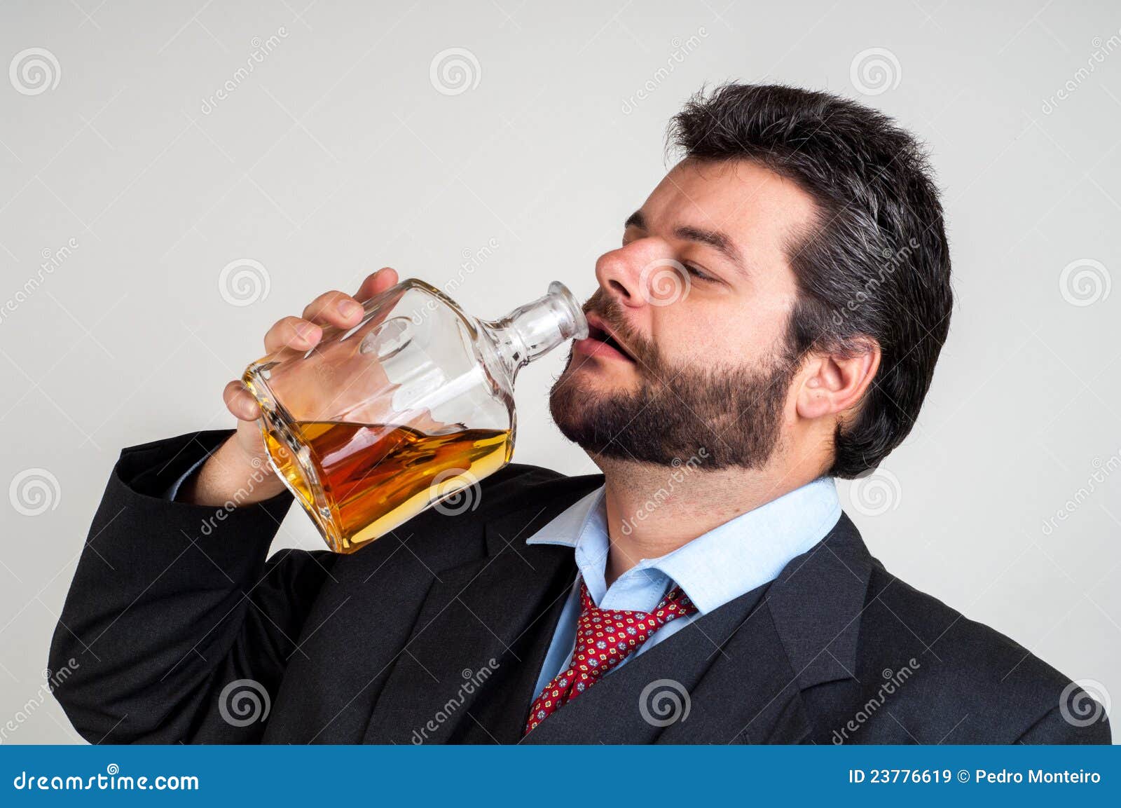 businessmen-drinking-bottle-whiskey-23776619.jpg