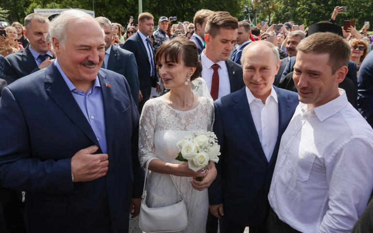 The two leaders met with residents of St Petersburg early on Sunday - Alexander Demianchuk/Sputnik/Kremlin/Pool/EPA-EFE/Shutterstock